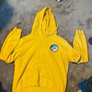 A Yellow sweat shirt from H&M with patch added. Size M